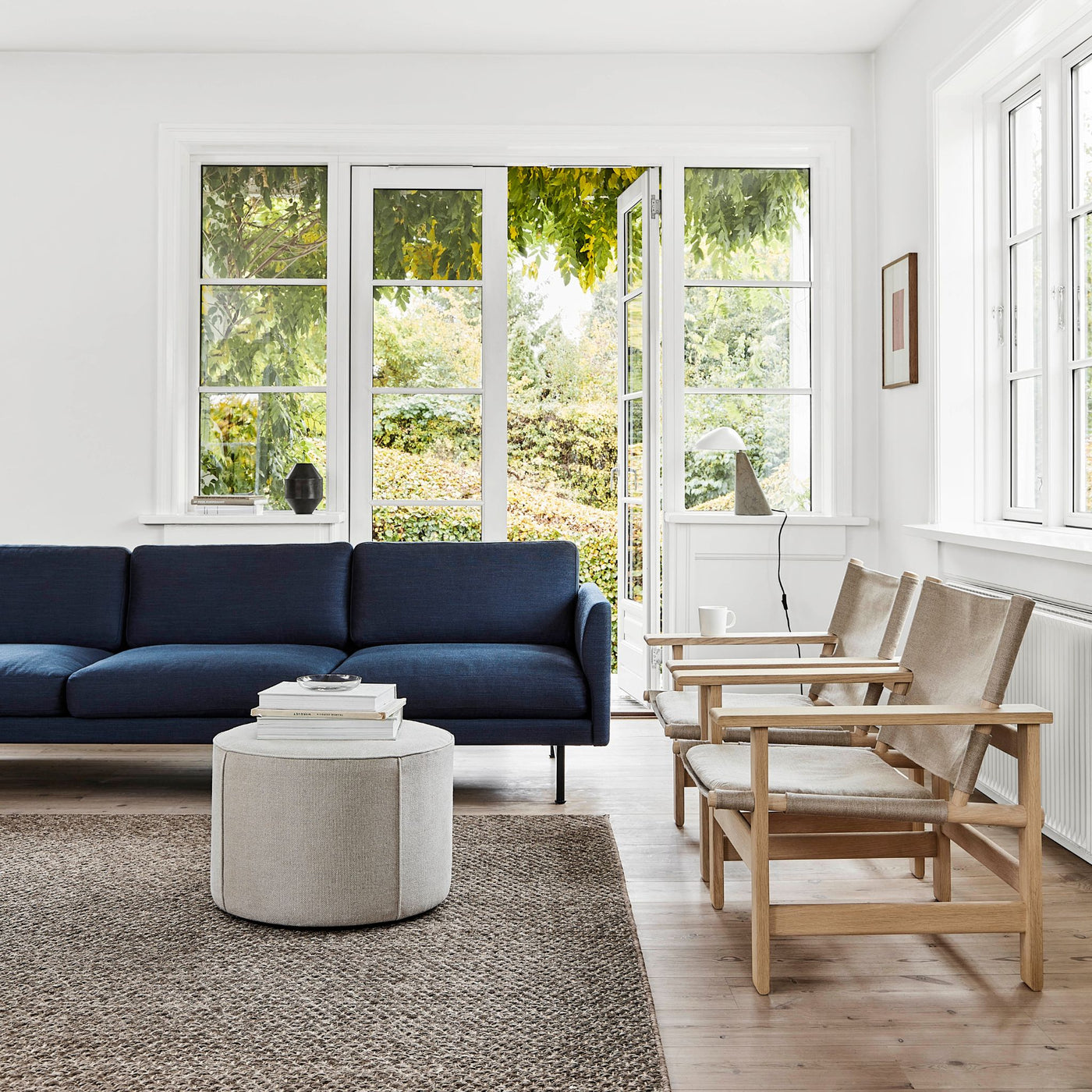 Fredericia Calmo Sofa and Borge Mogensen Canvas Chairs in Living Room with Abundant Natural Light