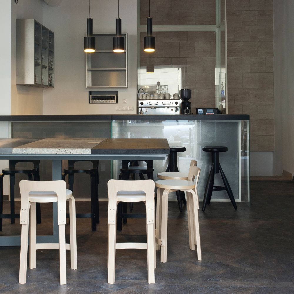 Artek Alvar Aalto K65 High Chairs Natural Birch in Modern Cafe with Black Grenade Lights