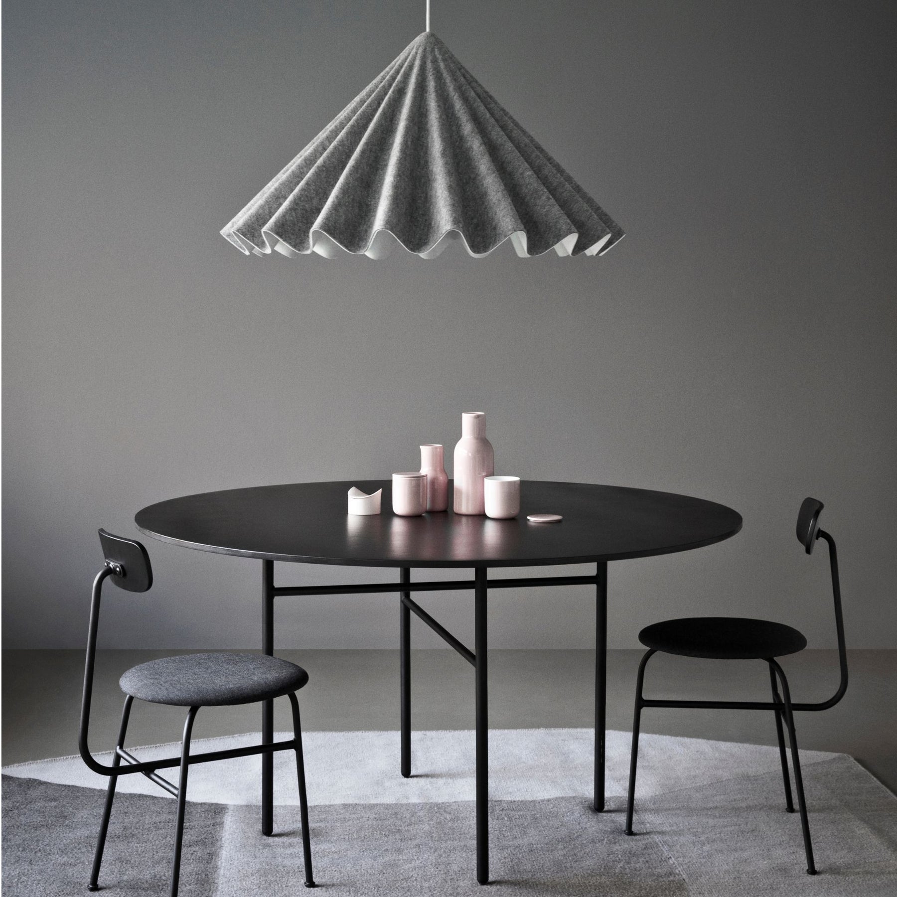 Audo Copenhagen Dancing Pendant by Iskos-Berlin in room with Afteroom Chairs