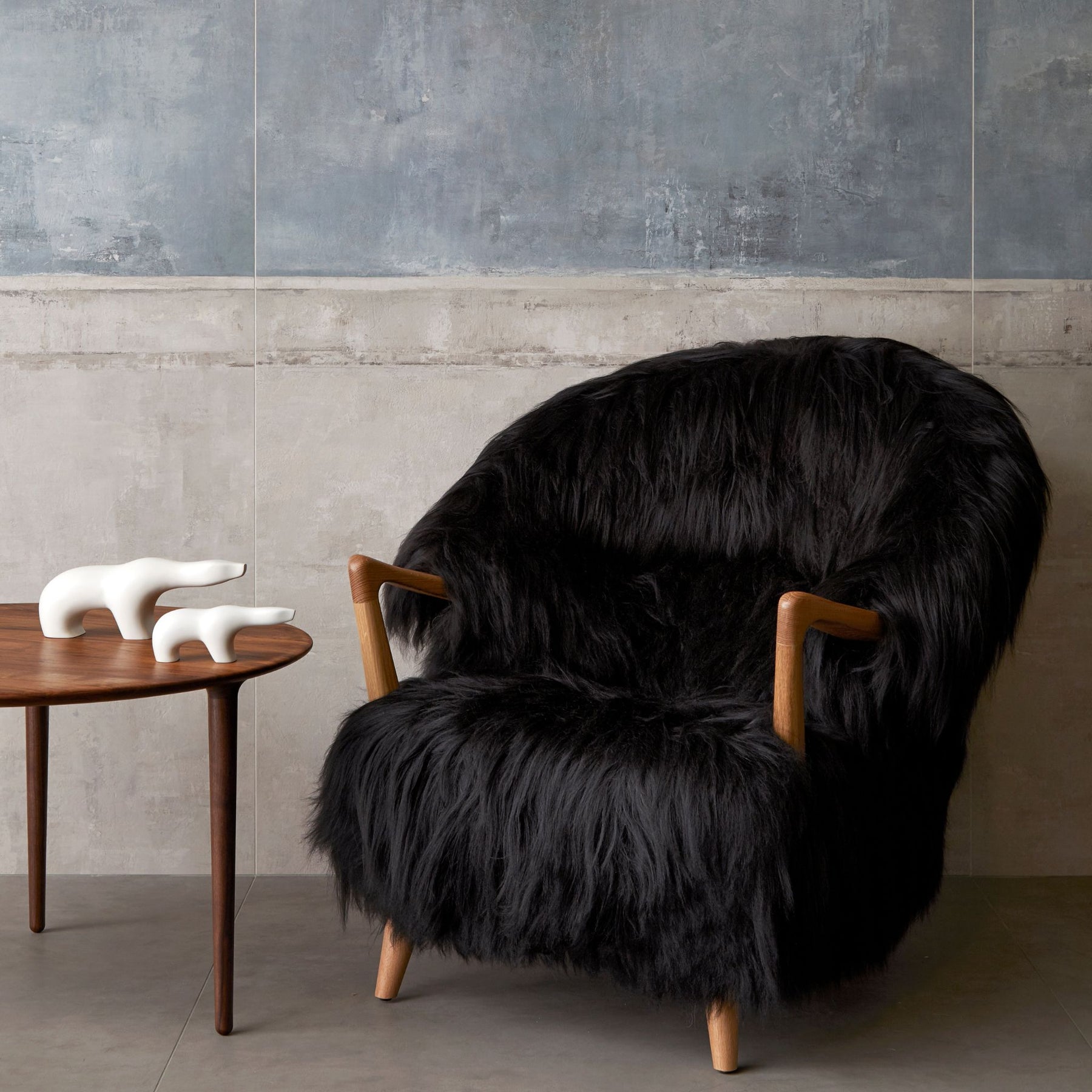 Eikund Fluffy Lounge Chair Black Sheepskin in Norwegian Loft with mini Polar Bears