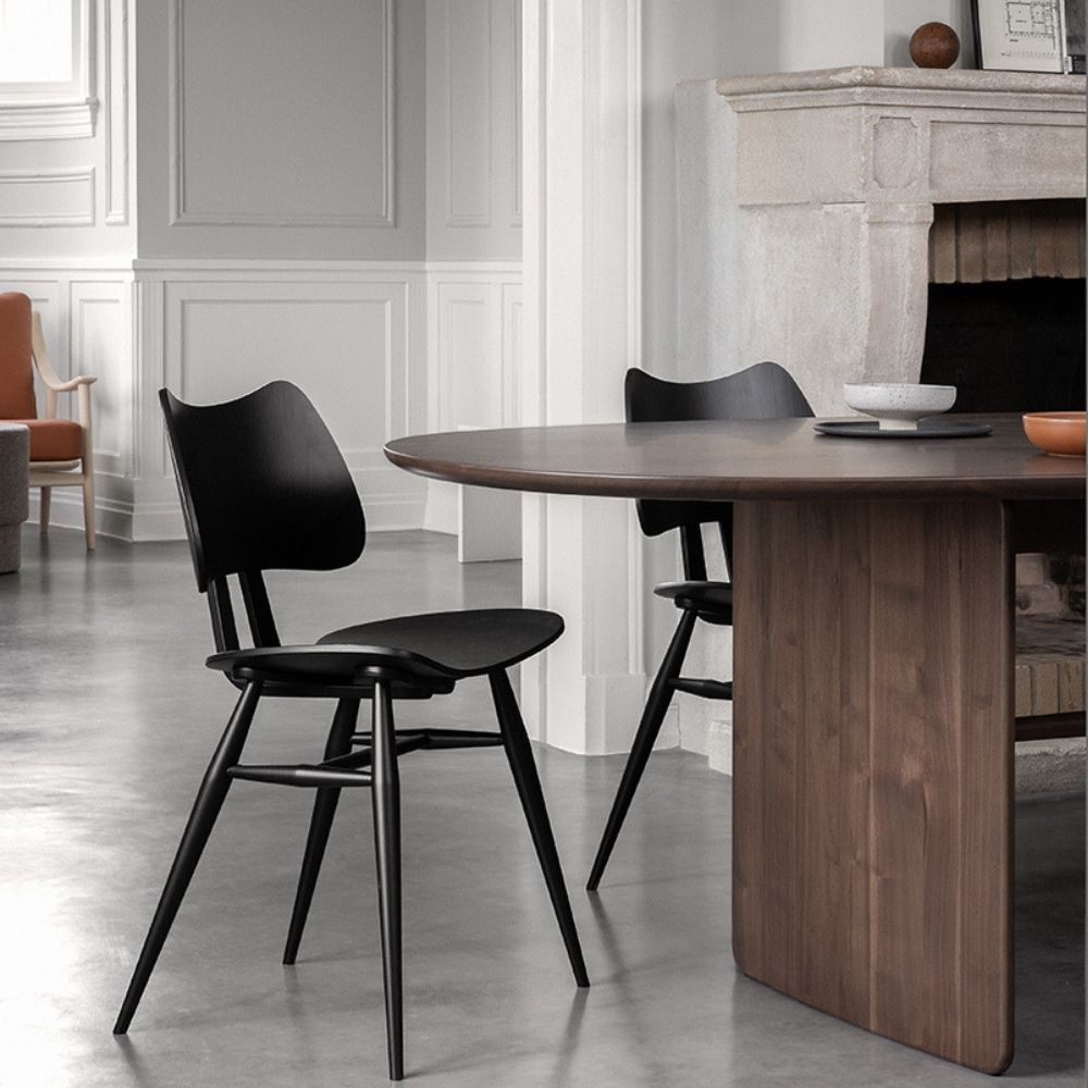 L.ercolani Pennon Table Walnut  by Norm Architects in Home Office with Black Butterfly  Chairs in Dining Room Detail