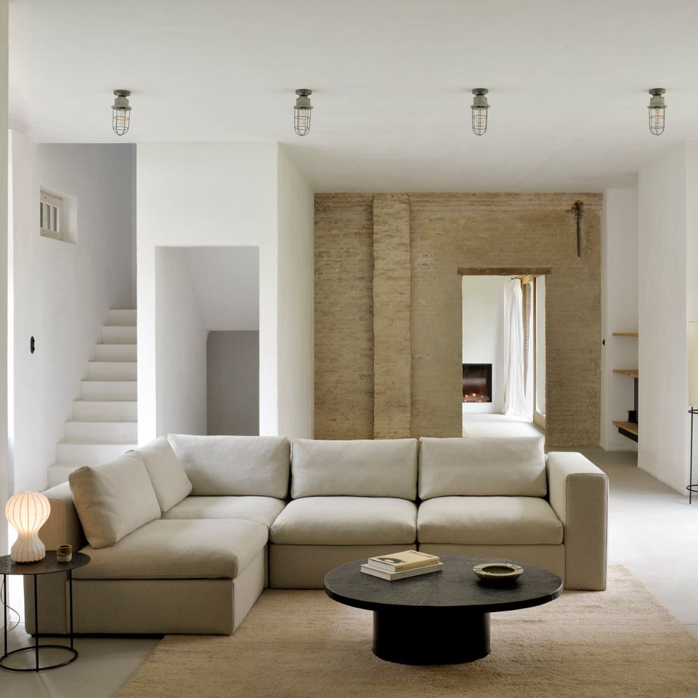 Ethnicraft Dunes Rug in living room with Mellow Sofa