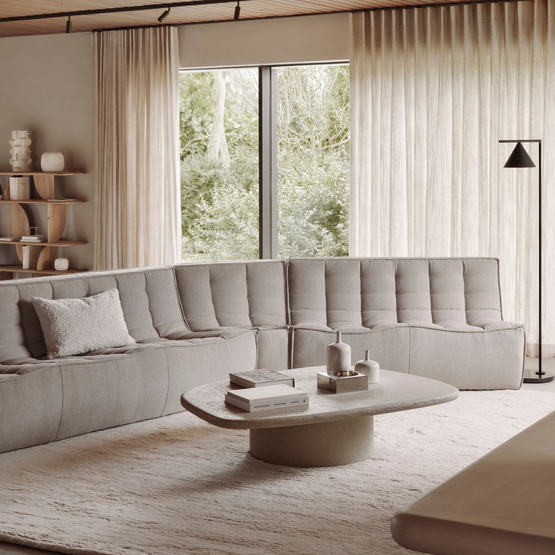 Ethnicraft Oak Geometric Rack behind N701 Sofa in Living Room