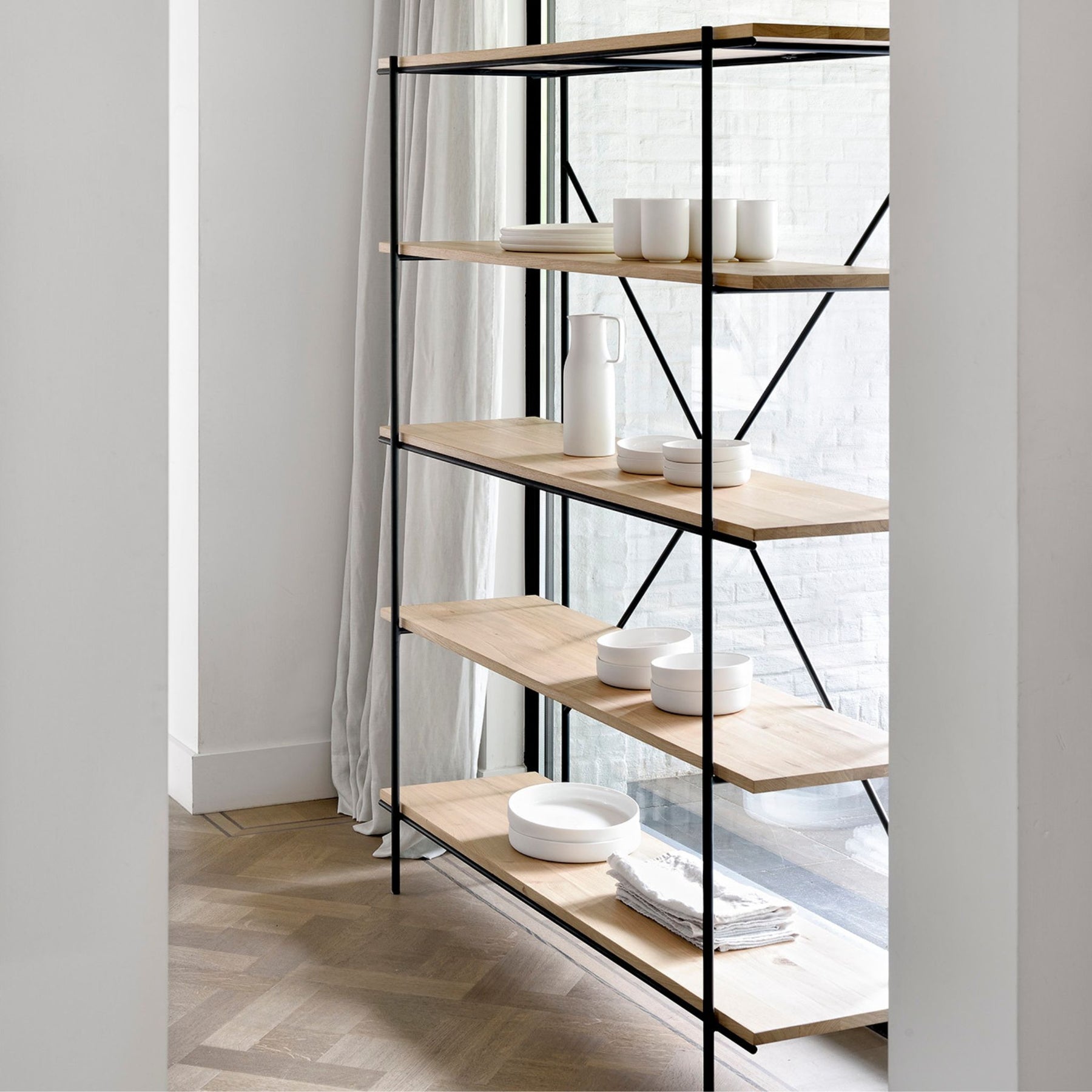 Ethnicraft Oak Rise Rack with Dishes by Window in Belgian Kitchen with Herringbone Floors