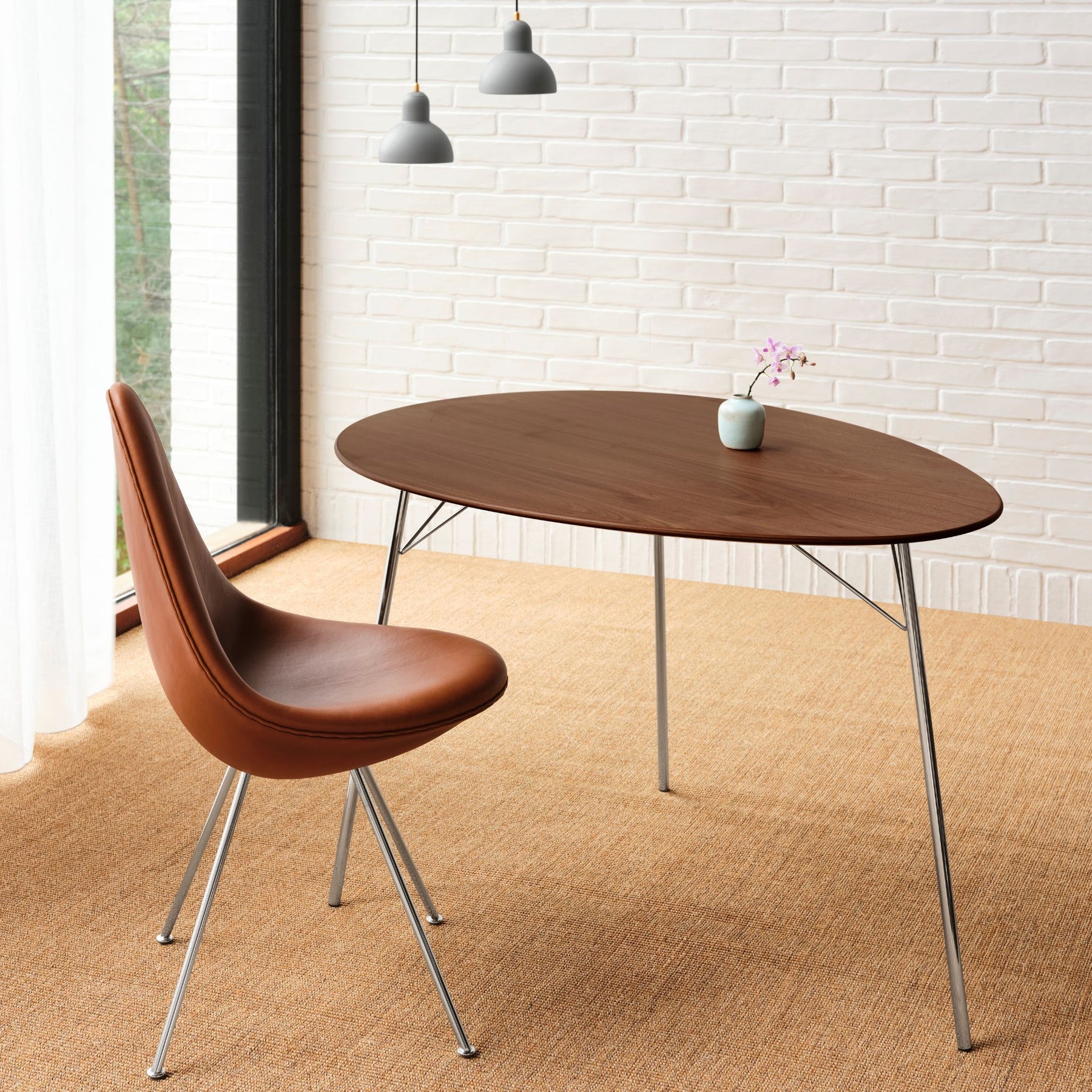 Fritz Hansen Egg Table by Arne Jacobsen in Home Office with leather Egg Chair and Bud Vase