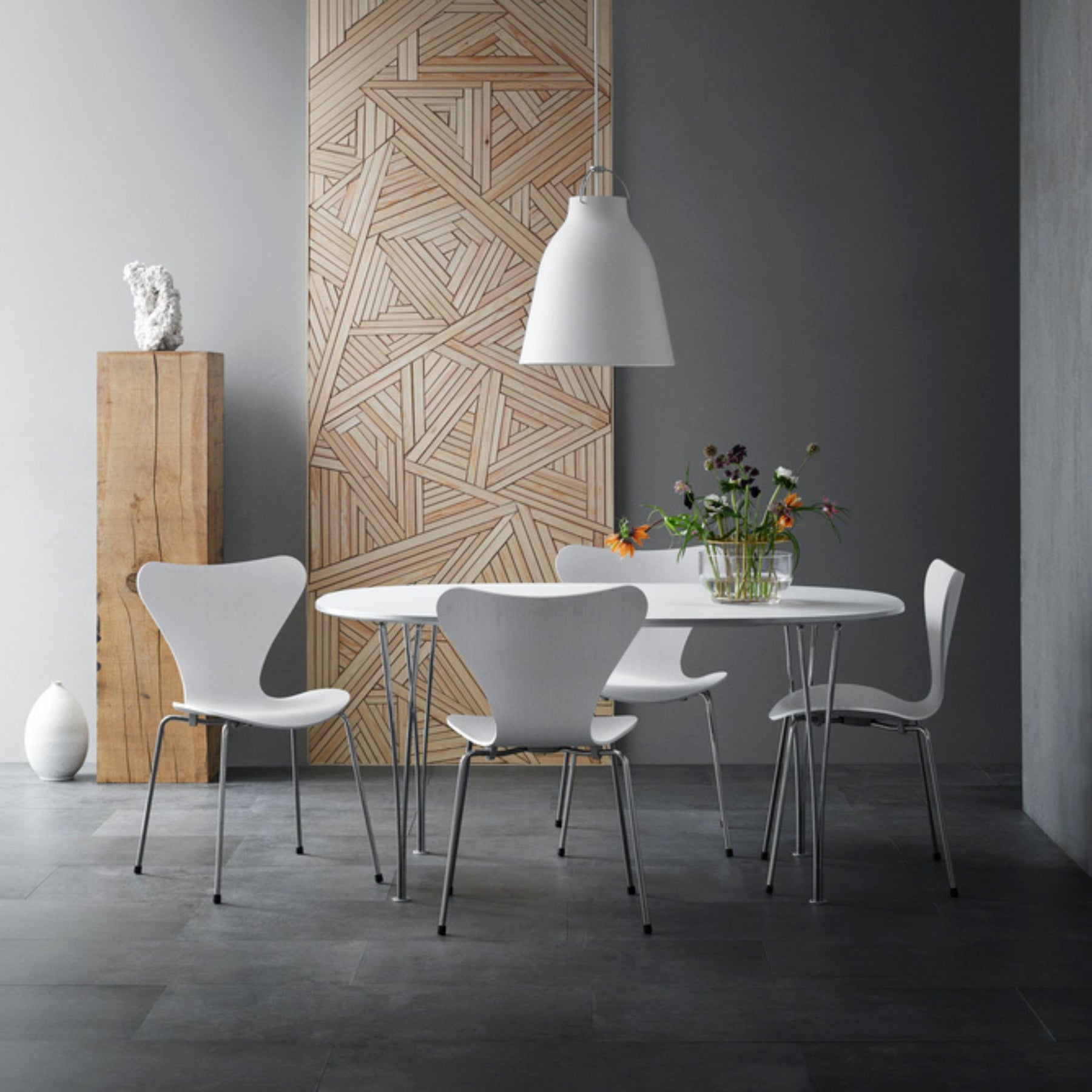 Fritz Hansen Series 7 Chair White Colored Ash in Room with Super Elliptical Dining Table and Caravaggio Pendant Light