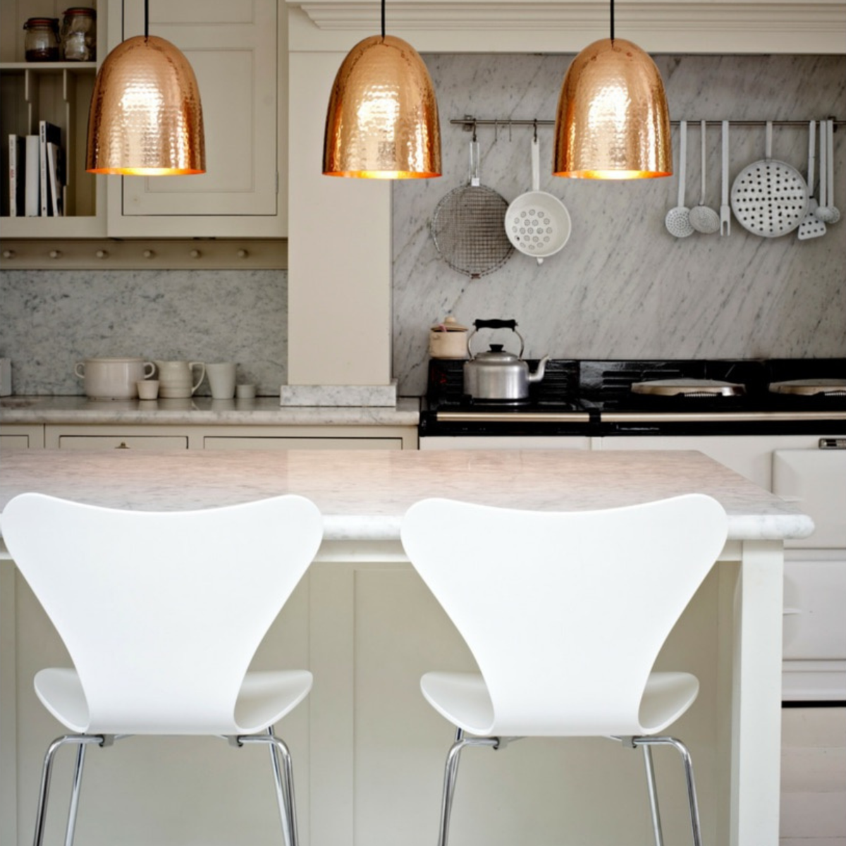 Fritz Hansen Series 7 Counter Stools in Kitchen with Original BTC Stanley Pendant Lights in Hammered Copper