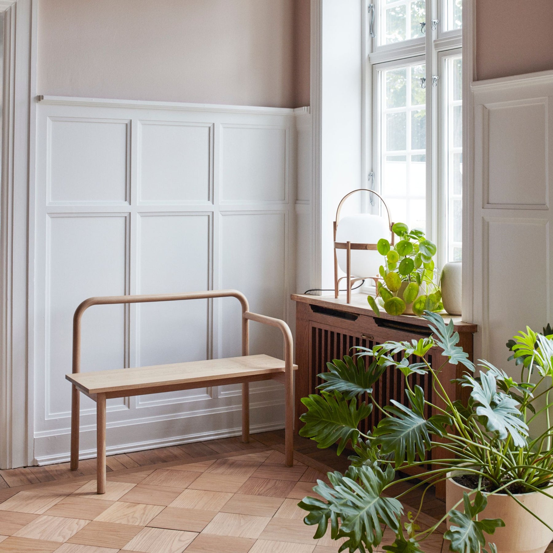 Fritz Hansen Skagerak Maissi Bench by Window in Copenhagen Apartment with Plants