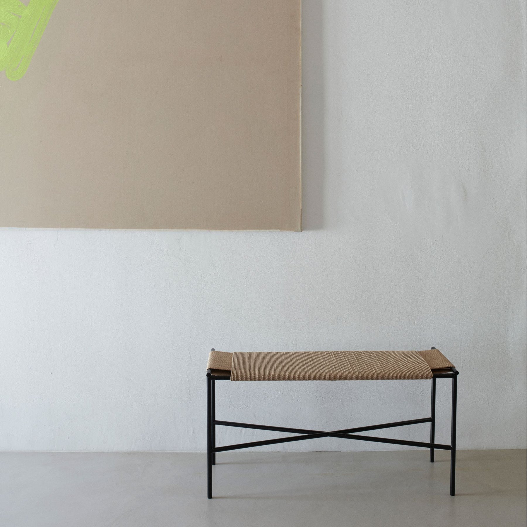 Fritz Hansen Skagerak Vent Bench in room with painting