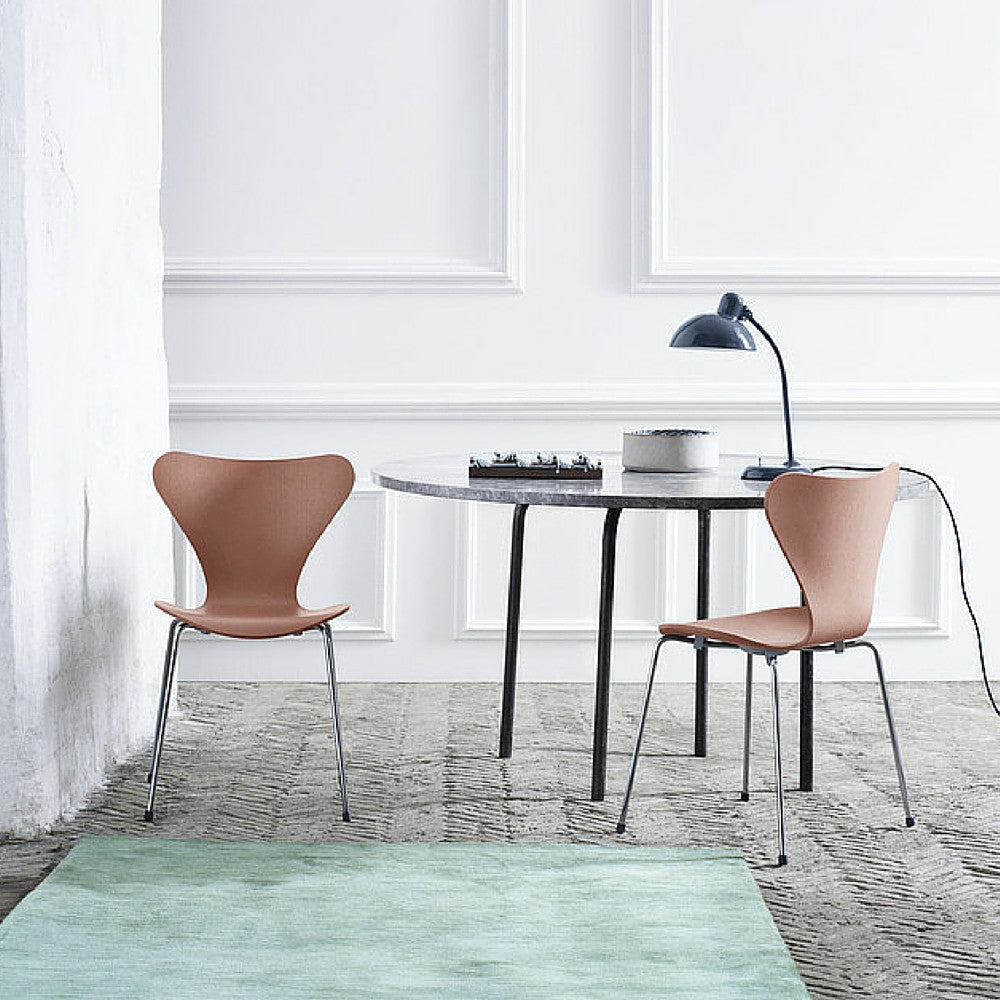 Series 7 Chairs Chocolate Milk in Room with Green Rug Fritz Hansen