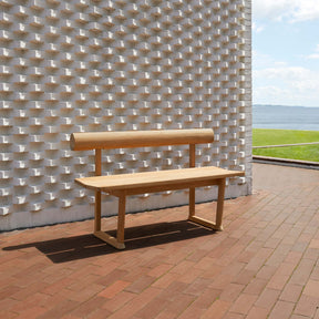 Fritz Hansen Skagerak Banco Bench Outdoors on Brick Patio by Museum