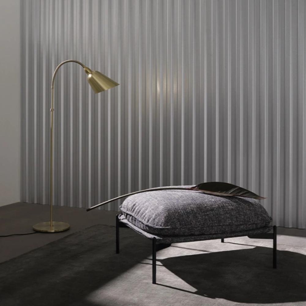 Arne Jacobsen Brass Bellevue Floor Lamp in Room with Luca Nichetto Cloud Ottoman And Tradition