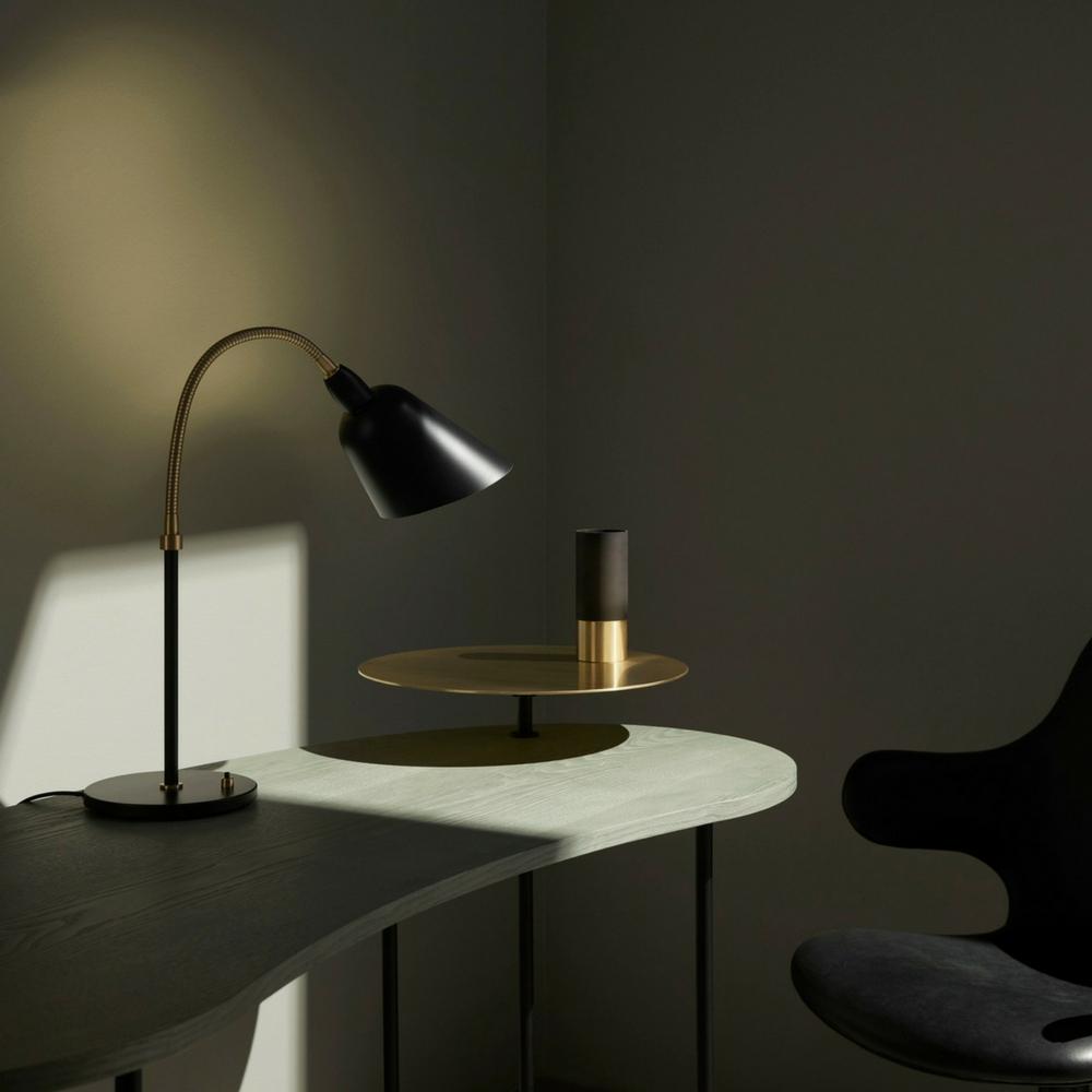 Black Arne Jacobsen Bellevue Table Lamp on Palette Desk Dark and Moody AndTradition Copenhagen