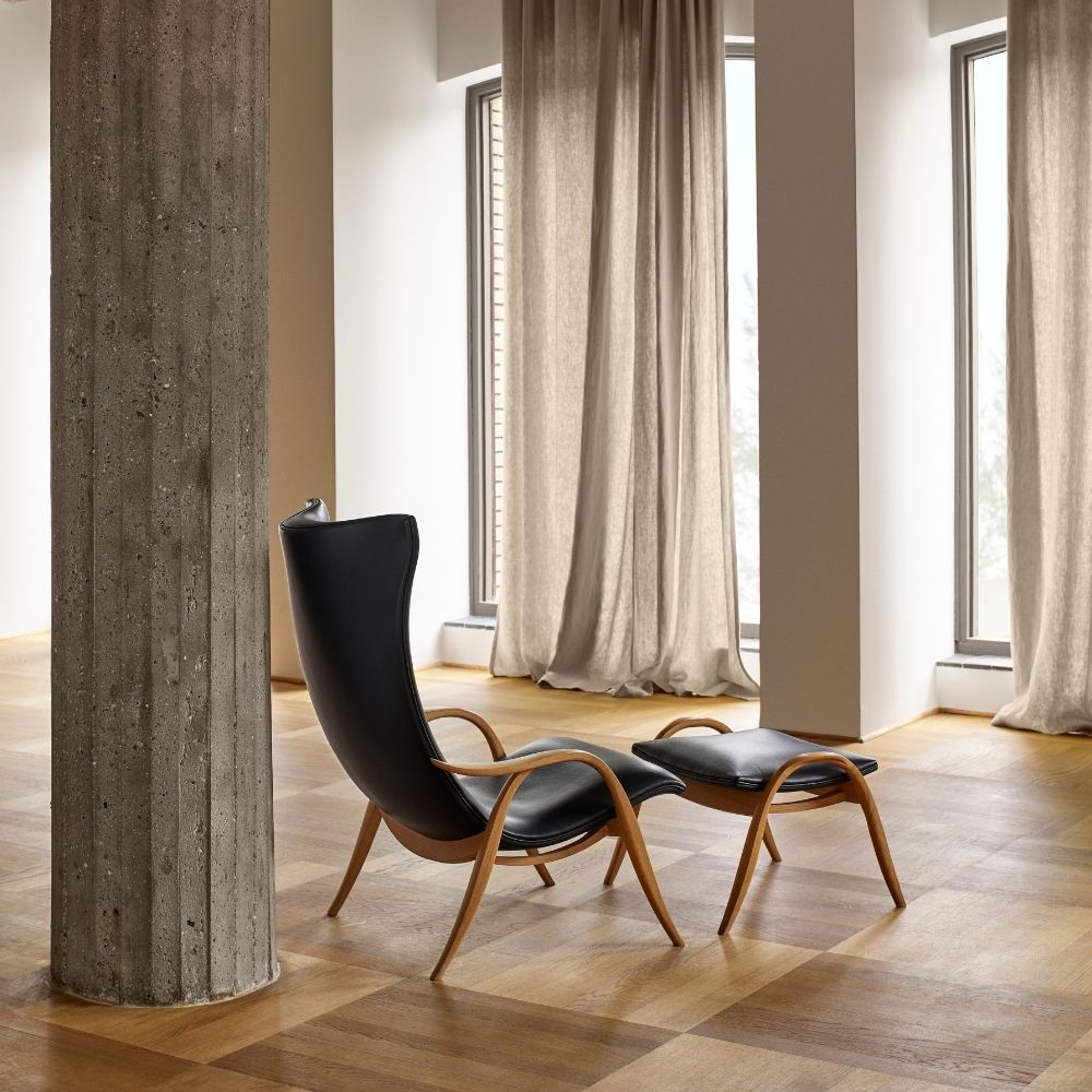 Carl Hansen FH429 Signature Chair by Frits Henningsen Black Leather SIF Oak Oil Frame in room with Linen Drapes