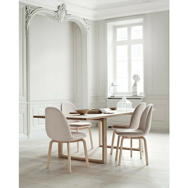 Cecilie Manz Essay Table in room with Sammen Chairs Jaime Hayon Fritz Hansen