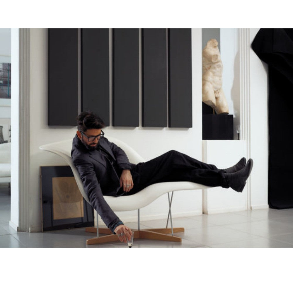 Charles and Ray Eames La Chaise White with Person Reclining Vitra