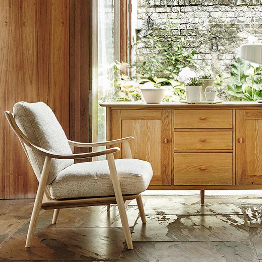 ercol Marino Chair Ash with taupe fabric in situ