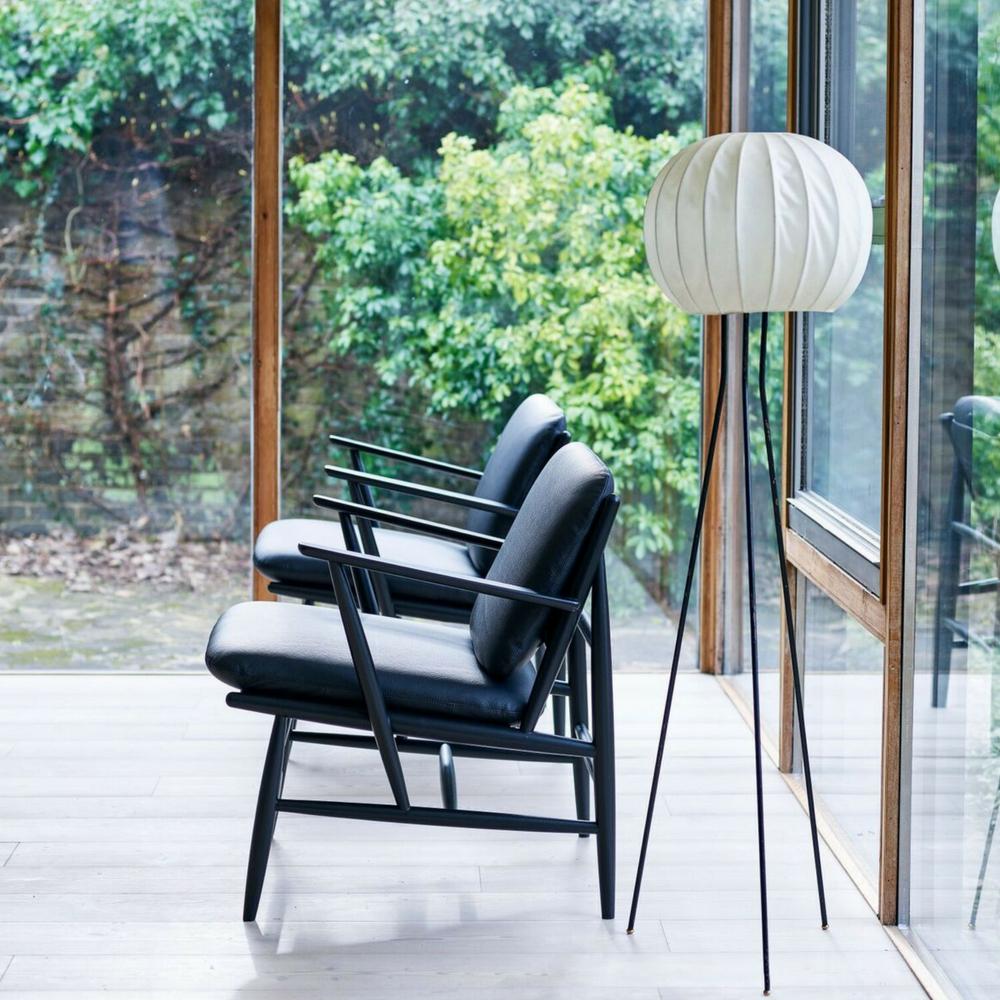 ercol Von armchairs black leather in living room side view