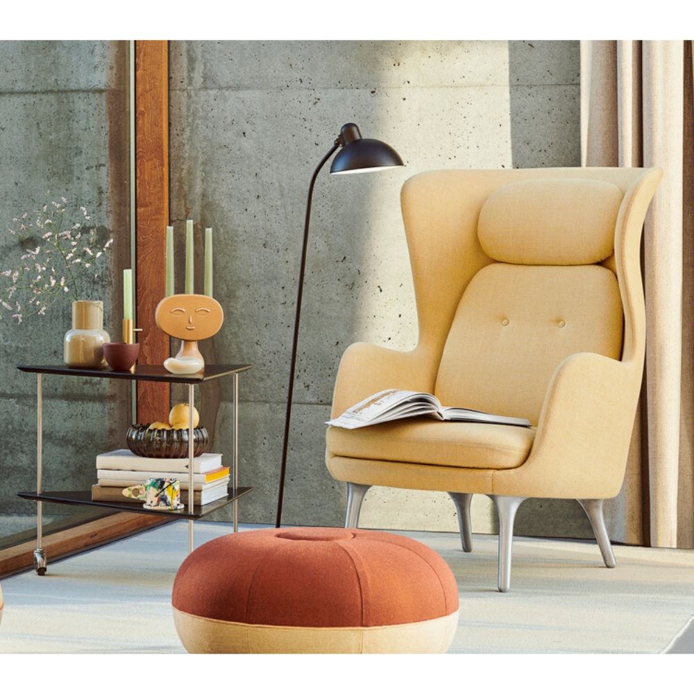 Fritz Hansen Arne Jacobsen Tea Trolley in room with Ro Chair, Kasier Idell Lamp, and Cecilie Manz Pouf