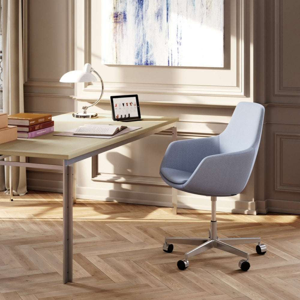 Fritz Hansen Arne Jacobsen Little Giraffe Chair in home office with Poul Kjaerholm Desk and Kaiser Idell Table Lamp