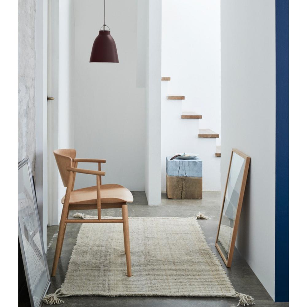 Fritz Hansen Caravaggio Pendant by Cecilie Manz in hallway with Nendo N01 Chair