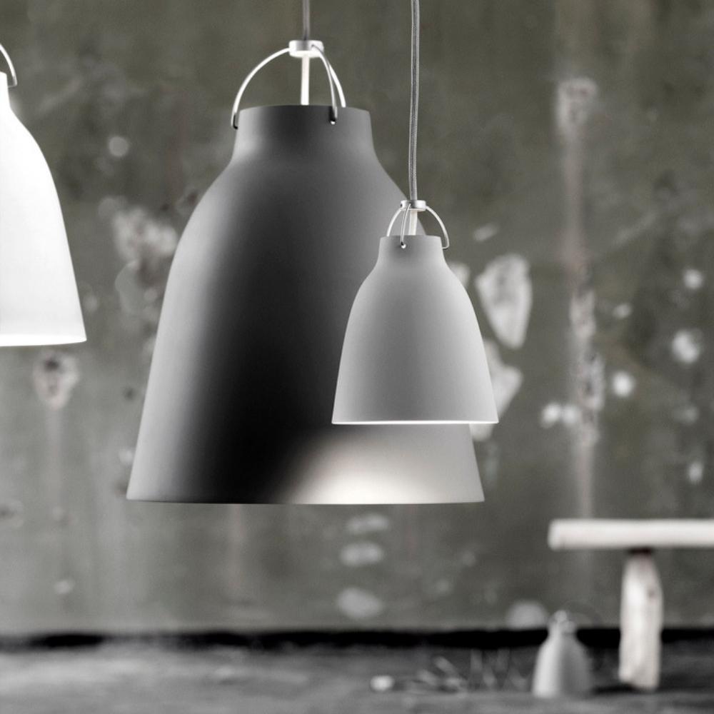 Fritz Hansen Caravaggio Pendant Lights by Cecilie Manz styled in warehouse