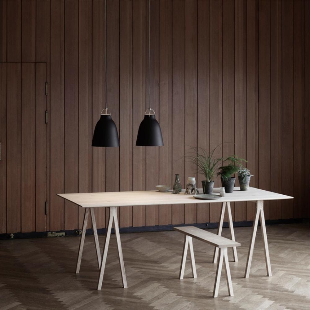 Fritz Hansen Cecilie Manz Caravaggio Pendant Lights in Black styled with Farm Table