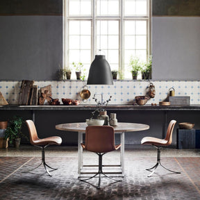 Fritz Hansen Caravaggio Pendant with Poul Kjaerholm PK54 Table and PK9 Chairs