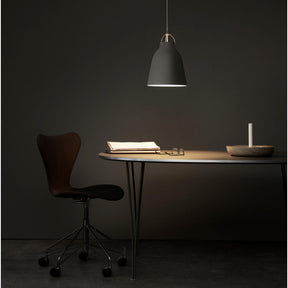 Fritz Hansen Cecilie Manz Caravaggio Pendant Light in home office with Super Elliptical Table and Series 7 Chair