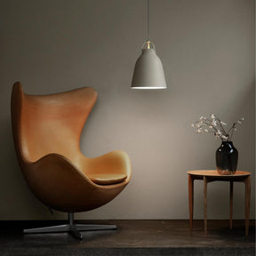 Fritz Hansen Caravaggio Pendant Light in room with Egg Chair