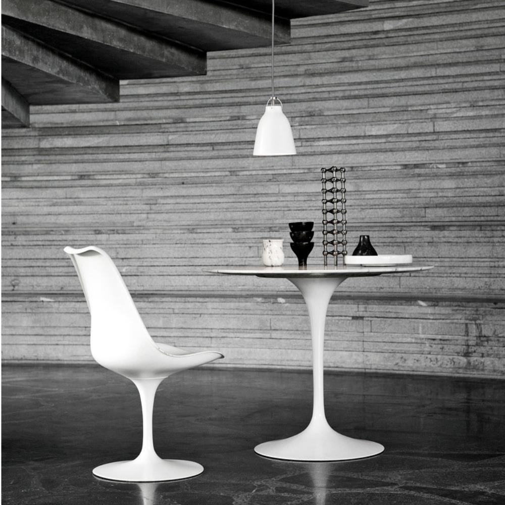 Fritz Hansen Cecilie Manz Caravaggio Pendant Light Gloss White in room with Saarinen Tulip Table and Tulip Chair