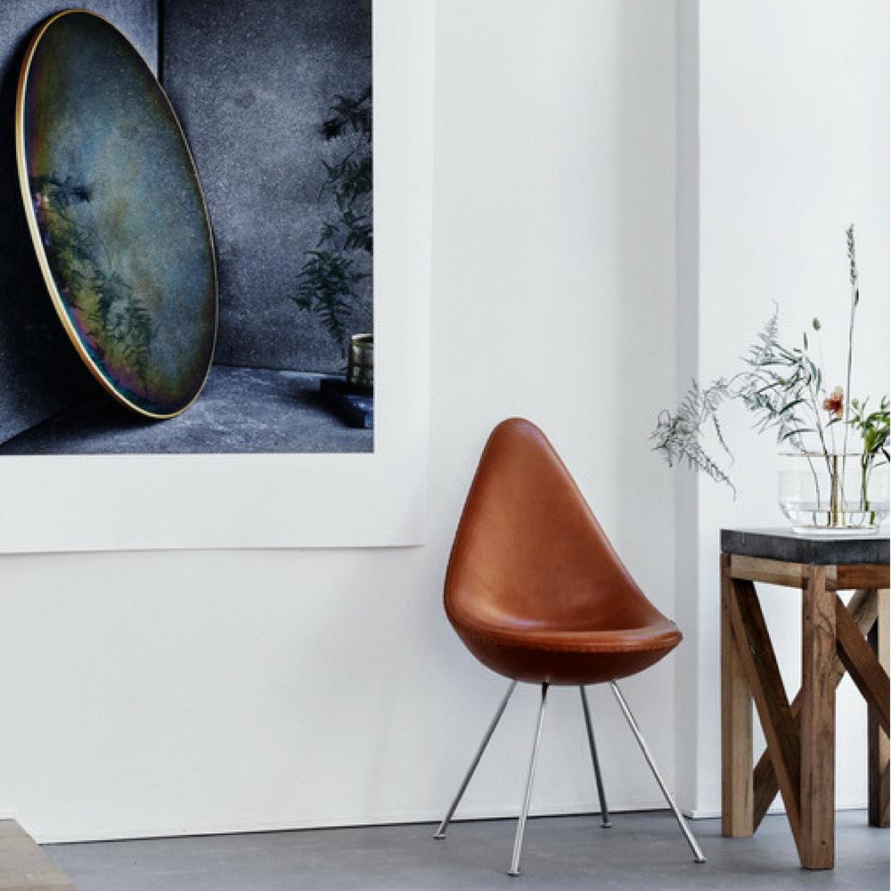 Fritz Hansen Leather Drop Chair in room with Ikebana Vase and Objects Mirror