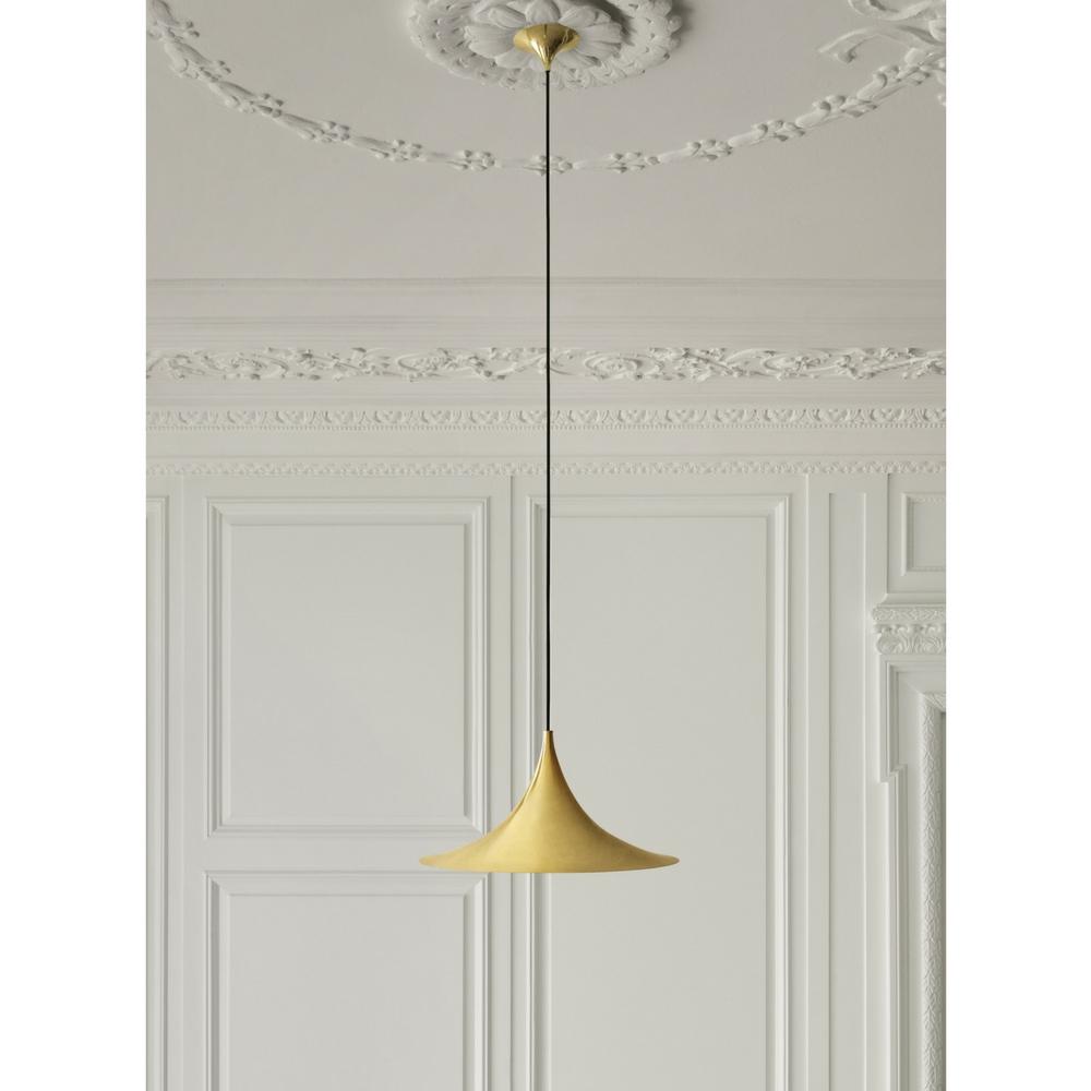 Gubi Brass Semi Pendant in room with Ceiling Medallion