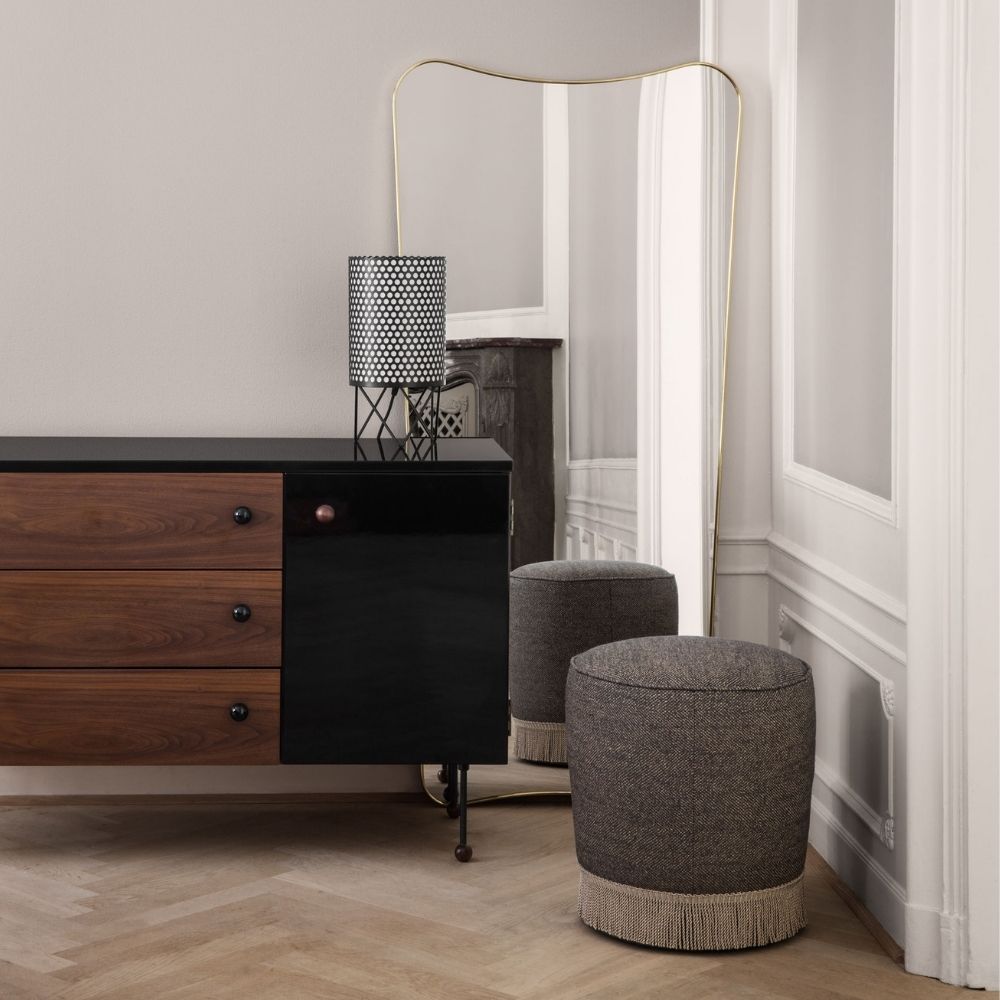 GUBI Gio Ponti F.A.33 Mirror in room with ABC Table Lamp and fringe Pouffe