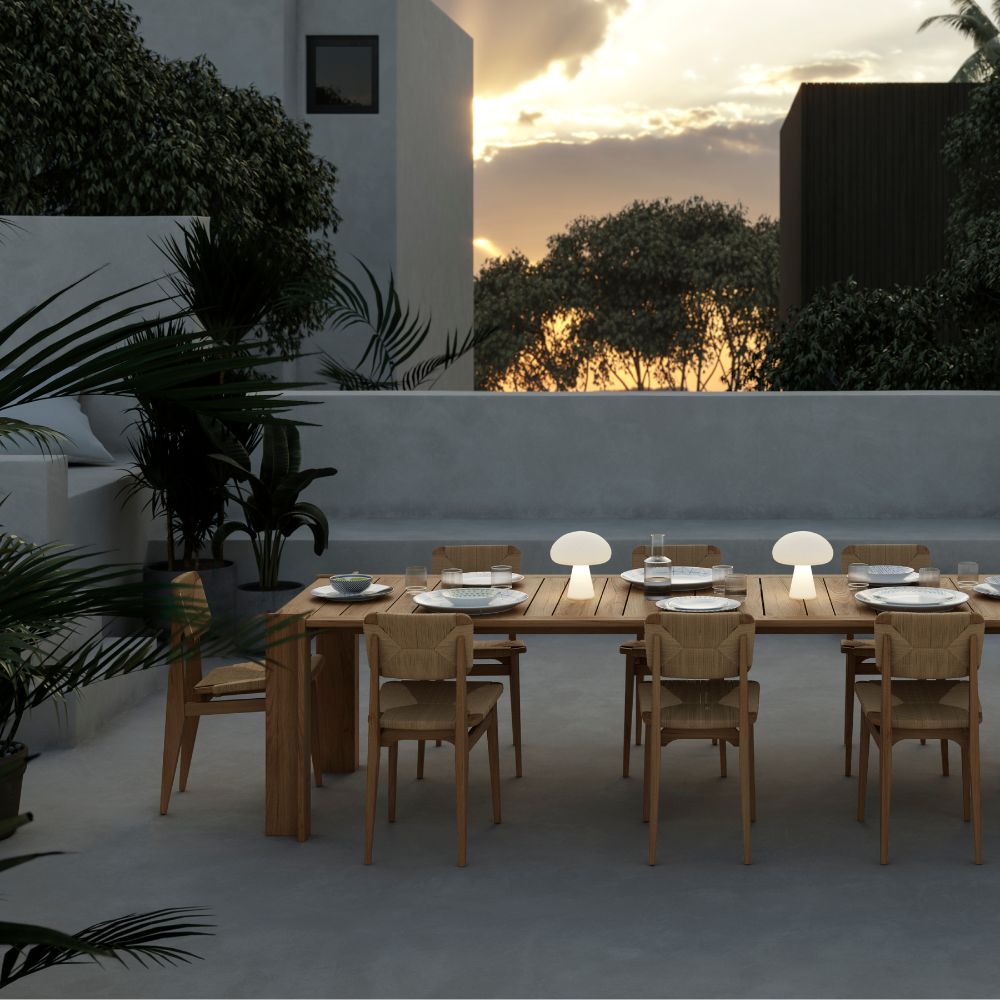 GUBI Outdoor C-Chairs by Marcel Gascoin with Obello Table Lamps by Bill Curry and Atmosfera Dining table by GUBI