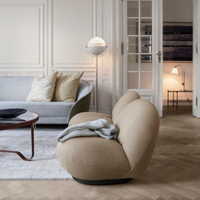 GUBI Pacha Lounge Chairs by Pierre Paulin in living room with Revers Sofa