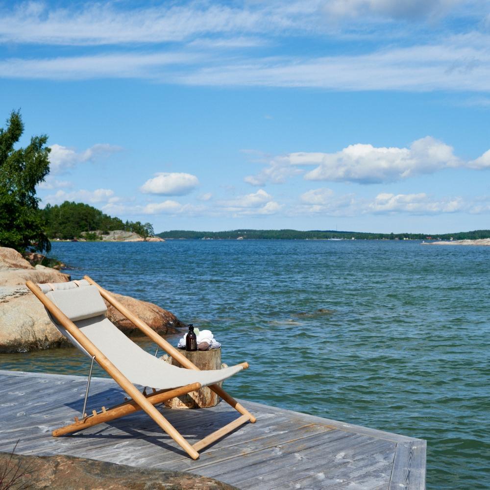 Skargaarden H55 Sun Lounger Outdoors at water's edge