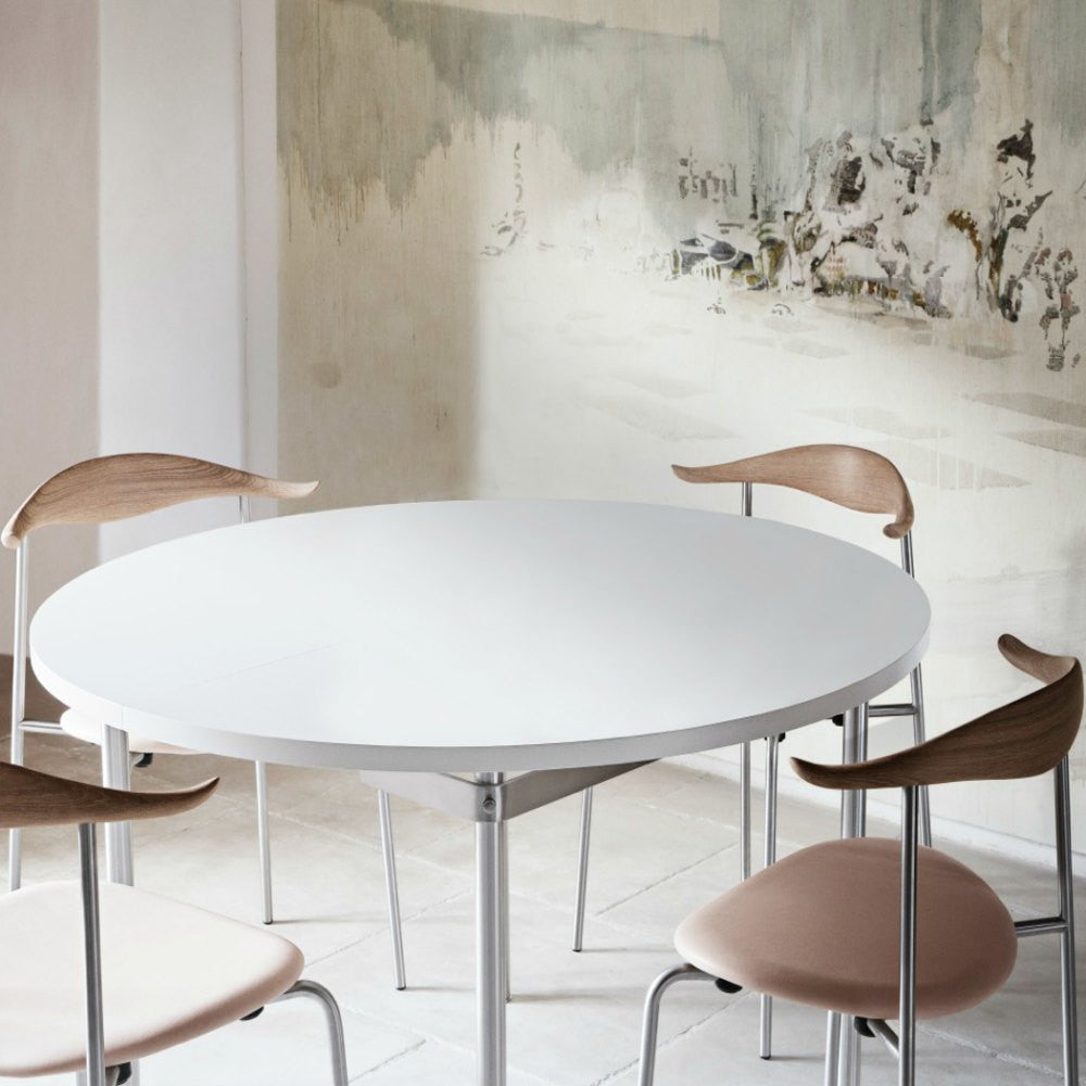 Hans Wegner CH388 Dining Table White with CH88 Chairs in Room with Mural Carl Hansen & Son