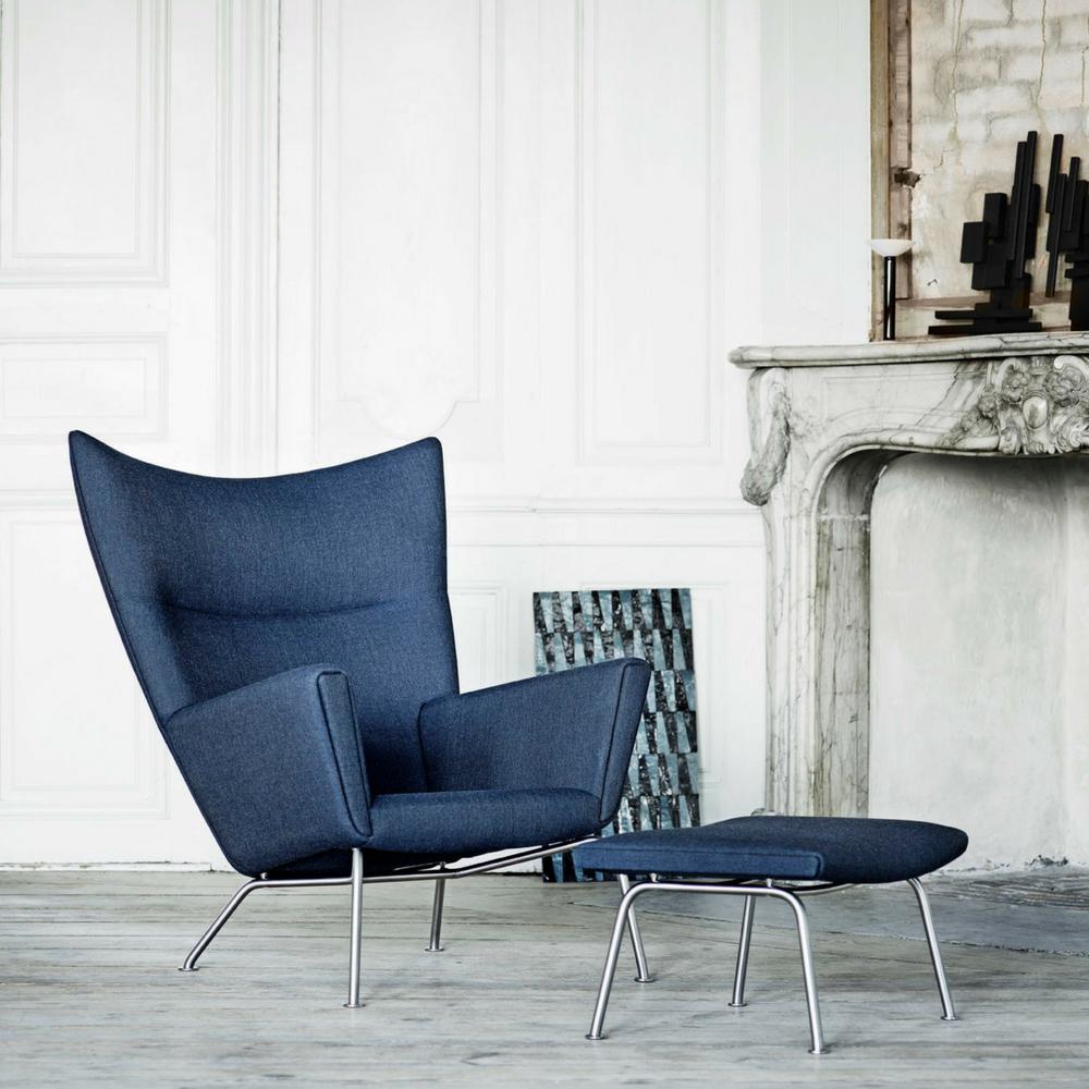 Wegner CH446 ottoman and CH445 Wing Chair in room Carl Hansen and Son