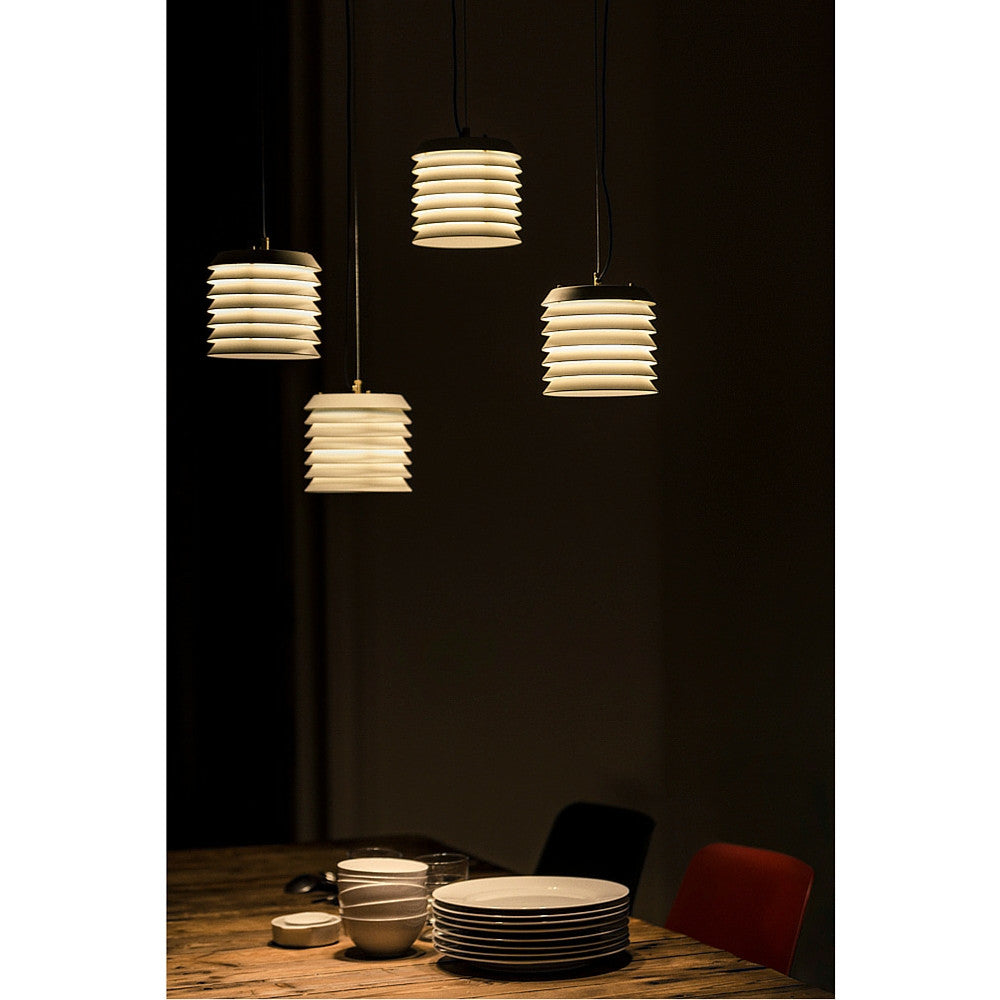 Ilmari Tapiovaara Maija Suspension Lamps over Dinner Plates by Santa & Cole