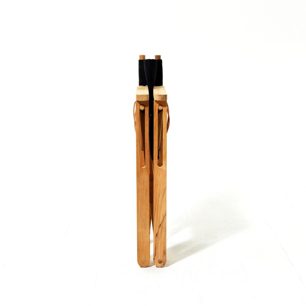 A folded Kryss Chair by Skargaarden