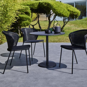 Caneline Lean Chairs Dark Grey with dark Bistro Table Outdoors