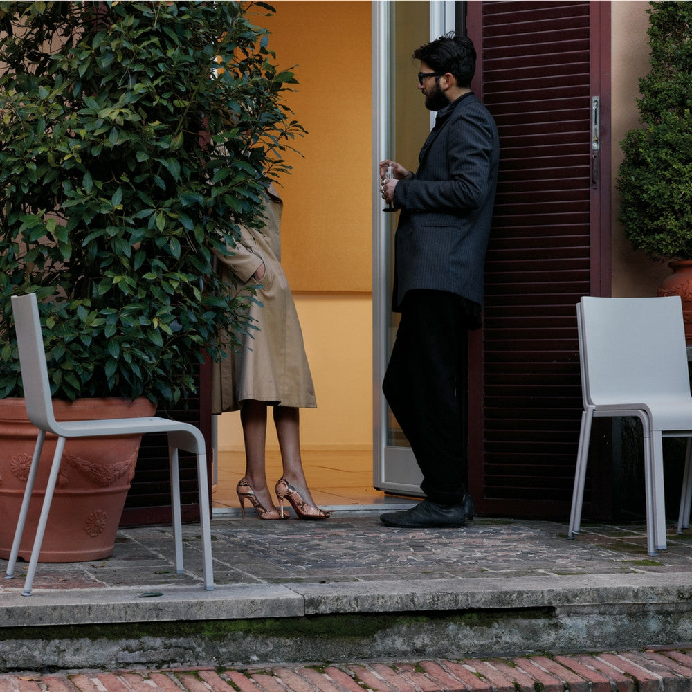 Nonstacking (left) and Stacking (right) versions of Maarten Van Severen's .03 Chair in Grey with Silver Legs from Vitra