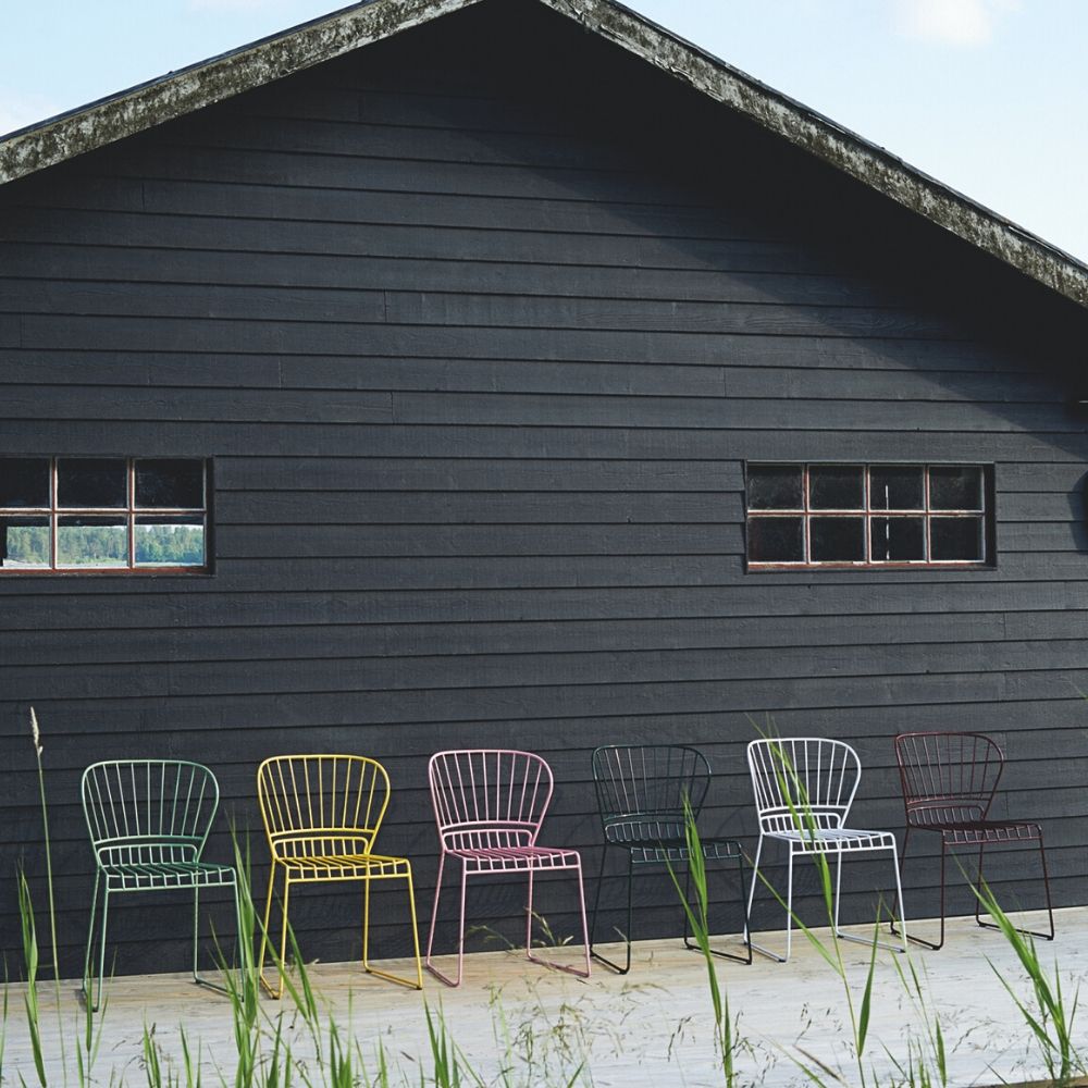 Light Green, Yellow, Pink, Dark Green, White, and Wine Red Resö Chairs by Matilda Lindblom for Skargaarden (Photo by Johan Carlson)