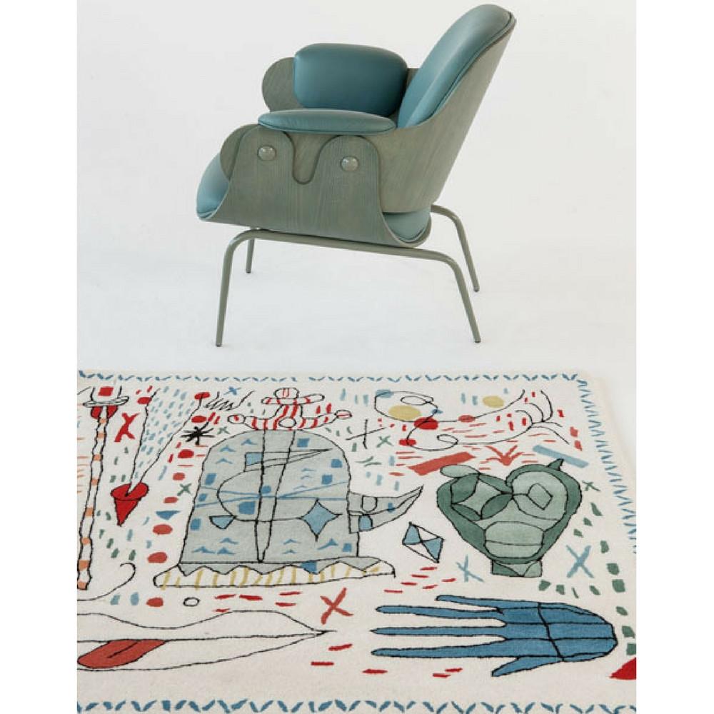 Nani Marquina Hayon x Nani Rug in room with chair