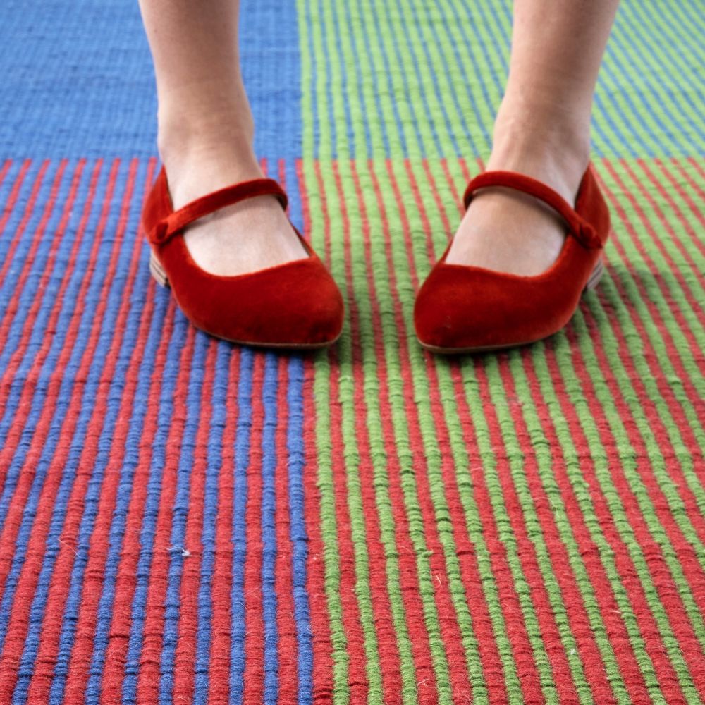 nanimarquina Haze 2 rug detail with red velvet mary janes