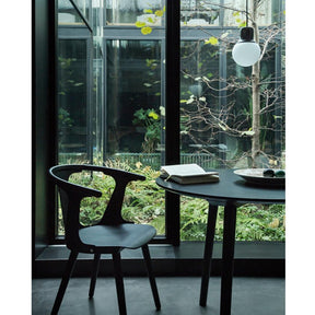 Norm Architects NA5 Mass Pendant Light Black Marble in room with Trestle Table