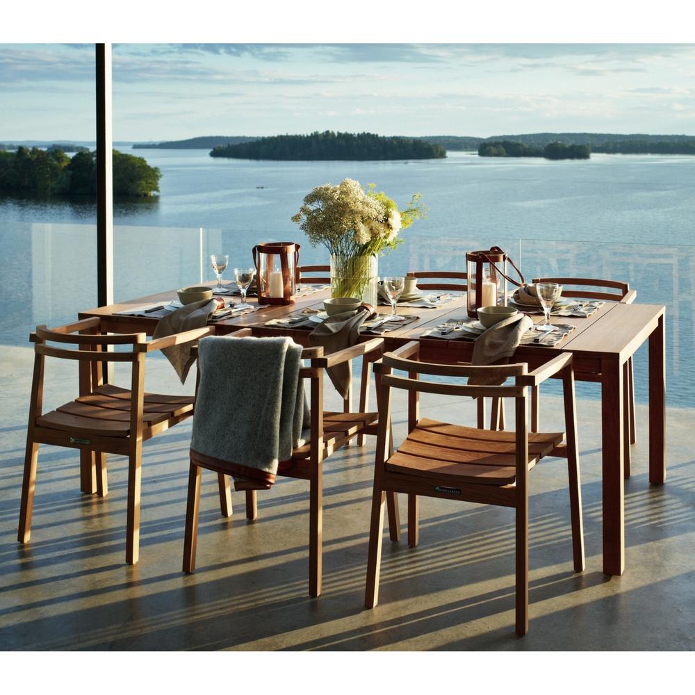 Oxnö Teak Dining Chairs and Table with Marstrand Candle Lanterns and Morup Throw by Skargaarden