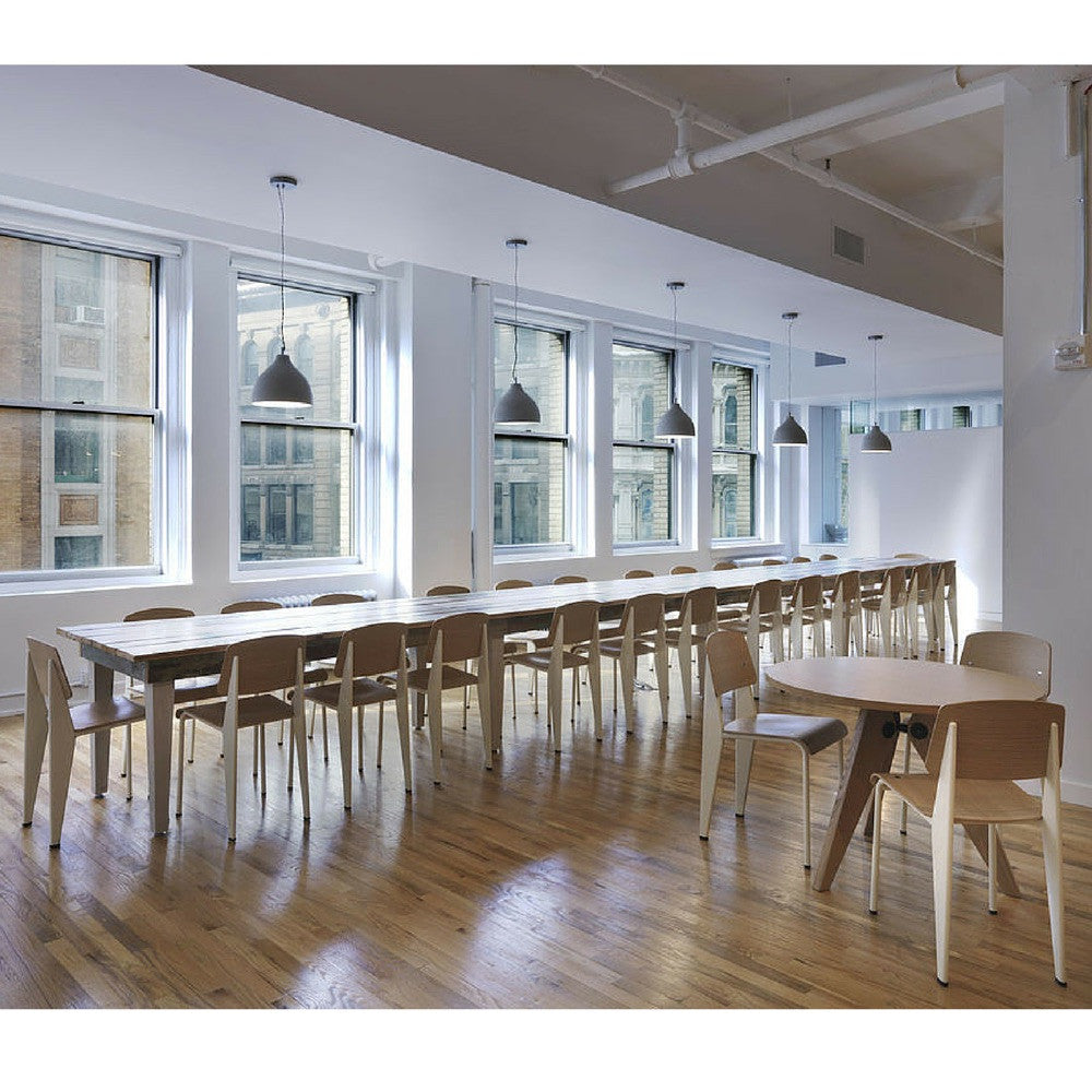 Prouve Gueridon Table in Startup Office Canteen with Standard Chairs Vitra