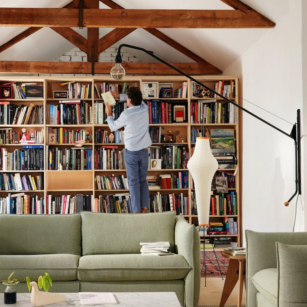 L'oiseau in situ with Prouvé Potence Lamp, Map table, and Mariposa Club Sofa